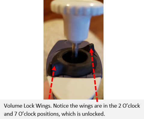 Pipet-Lite volume lock wings in unlocked position
