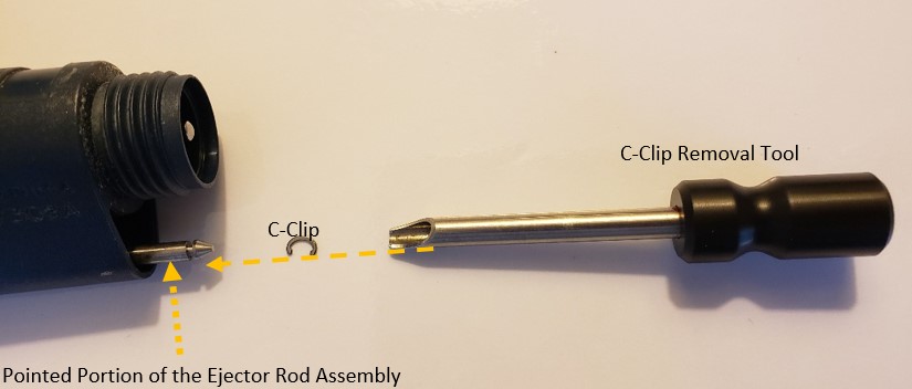 C-Clip removal tool and C-Clip, pointed portion of the ejector rod assembly