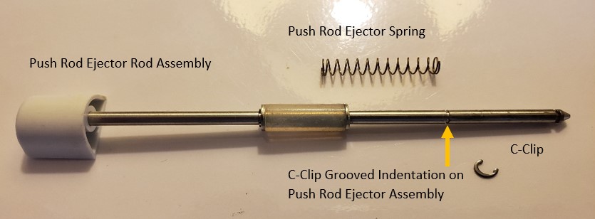 Disassembled push rod ejector assembly