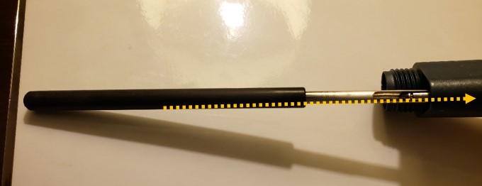 C-clip and insertion tool placed inside of pipette body to place the c-clip