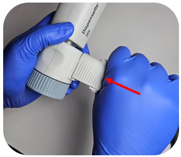 Dispensette S discharge tube reseating
