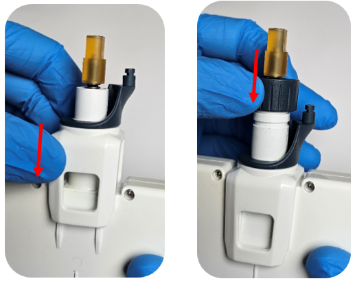 Reattaching the ejector interface and connecting nut to the housing.