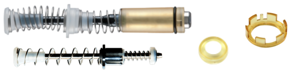 Two disassembled Gilson pipette components with metal, plastic, and rubber parts are aligned horizontally next to individual circular and ring-shaped pieces, showcasing the precision behind Gilson Pipette offerings.