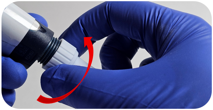 A gloved hand twists the connecting nut onto a pipette, with a red arrow indicating the direction to turn.